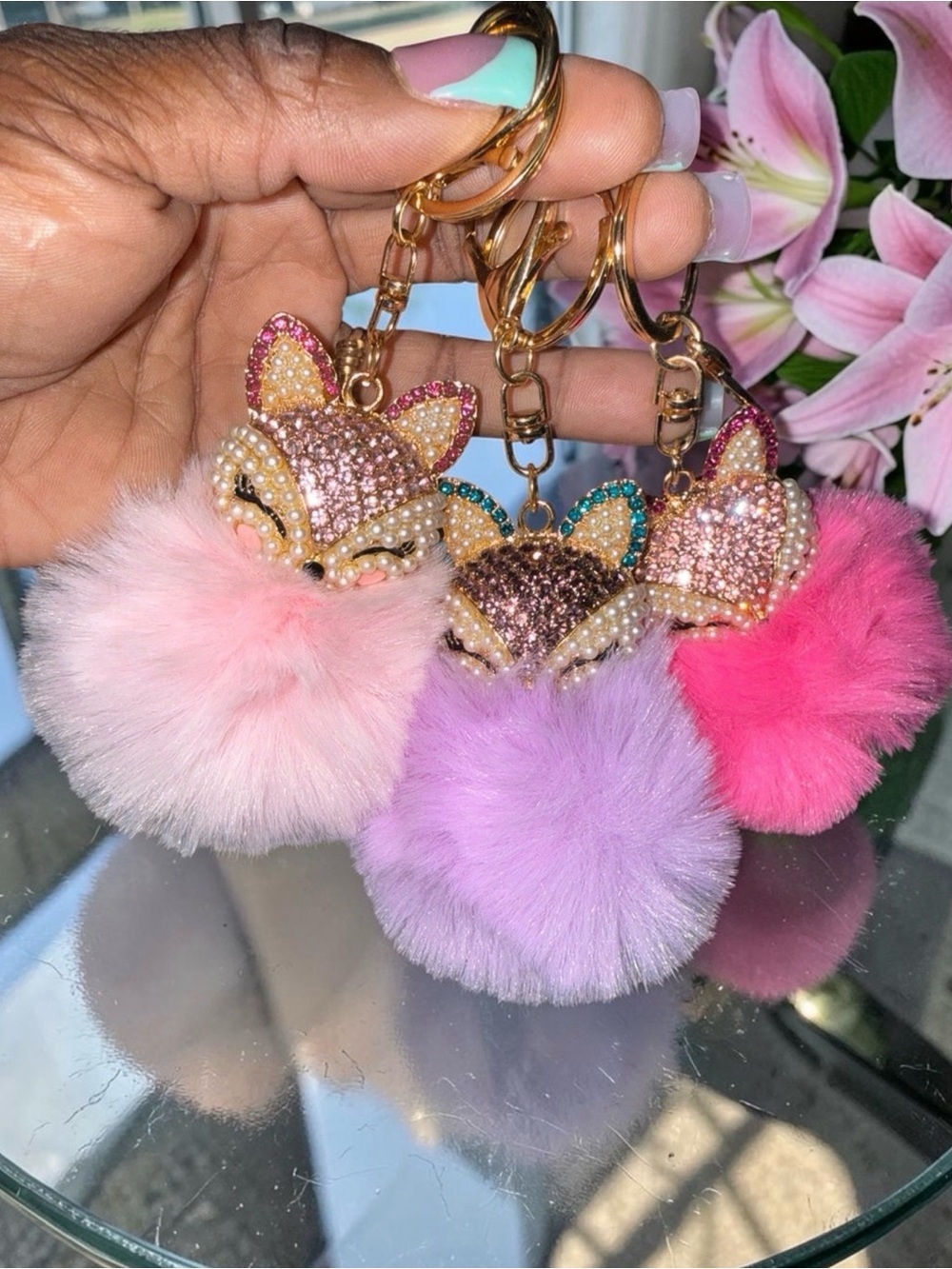 One (1) Sparkling Sleeping Fox Pom Keychain Pink, Lavender, or Hot Pink.